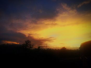 Scenic view of dramatic sky during sunset