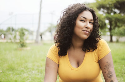 Young woman with curly hair