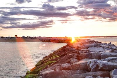 Scenic view of sea against sky during sunset