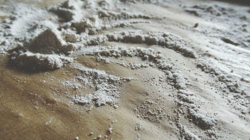 Close-up of sand on beach