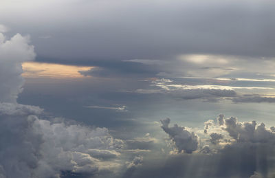 Low angle view of cloudscape against sky during sunset