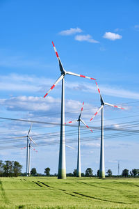 Wind power plants and overhead power lines seen in germany