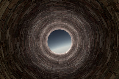 3d rendering of an old and deep brick tunnel