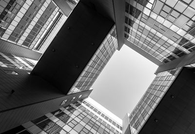 Low angle view of modern buildings against clear sky