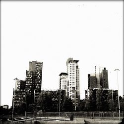 Buildings against clear sky