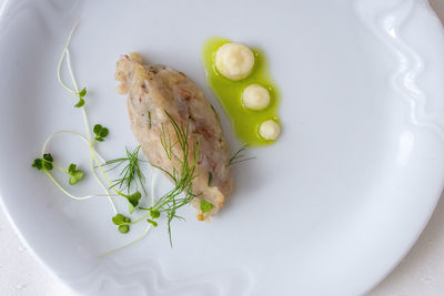 High angle view of vegetables in plate on table