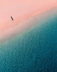 Aerial view of woman on beach