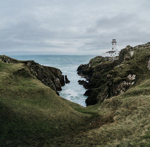 Scenic view of sea and buildings against sky