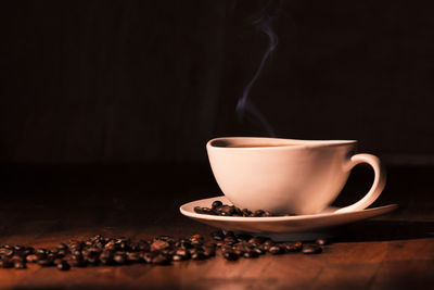 Close-up of coffee cup on table