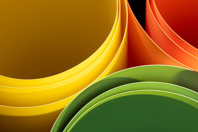 Vibrant color curve background, orange, yellow and green, dynamic movement, bending plastic sheets