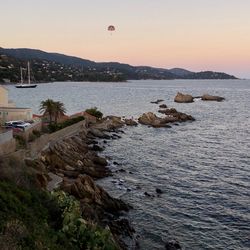 Scenic view of sea against sky during sunset