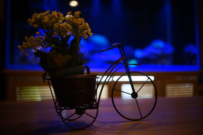 Close-up of flower vase on table