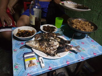 High angle view of people on table