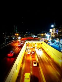 High angle view of light trails on road in city