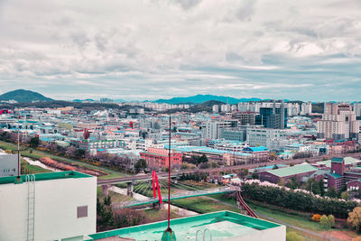High angle view of buildings against sky
