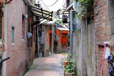 Narrow alley along buildings