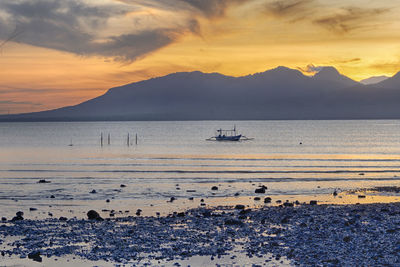 Scenic view of sunrise at bali strait view from banyuwangi