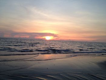 Scenic view of sea at sunset