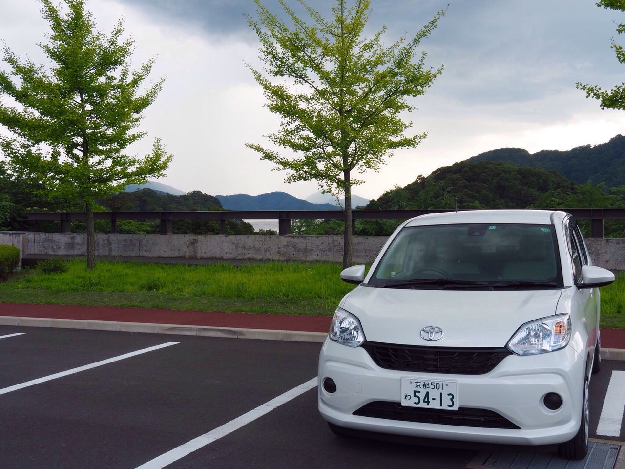 transportation, tree, sky, car, road, day, cloud - sky, outdoors, land vehicle, no people, nature