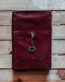 Directly above shot of closed wooden door on table