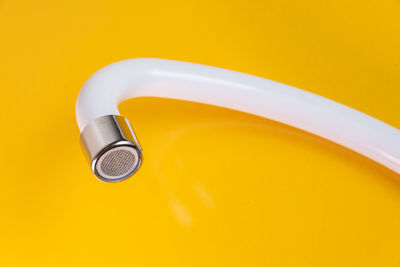 White kitchen sink faucet - close up