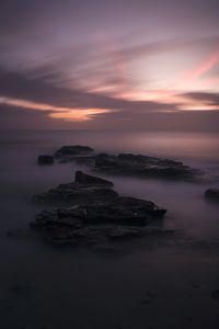 Scenic view of sea during sunset