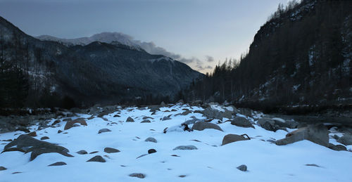 Scenic view of snow covered mountains