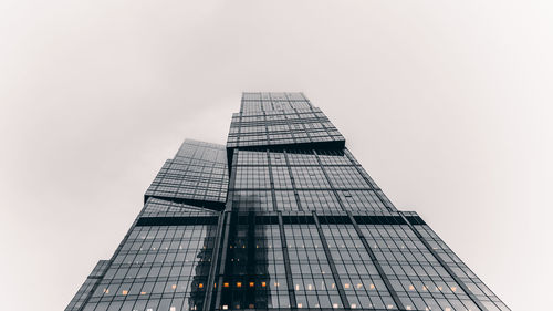 Low angle view of modern building against clear sky