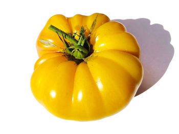 Close-up of lemon against white background