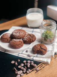 Close-up of cookies in glass on table