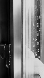 Close-up of text on glass