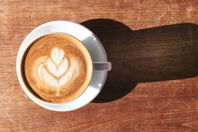 High angle view of cappuccino on table