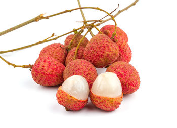 Close-up of fruits against white background