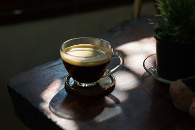 High angle view of coffee cup on table