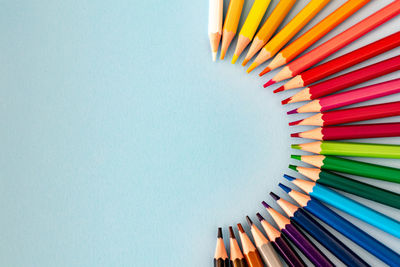 High angle view of multi colored pencils on table