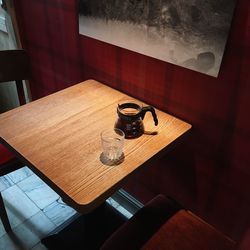 High angle view of coffee cup on table