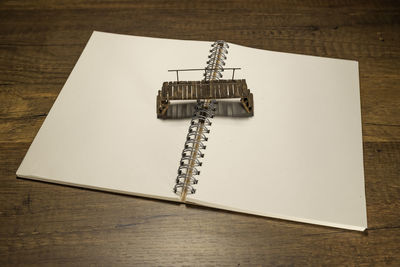 High angle view of telephone booth on table