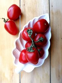 High angle view of cherry tomatoes on table