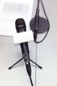 High angle view of microphone stand on table