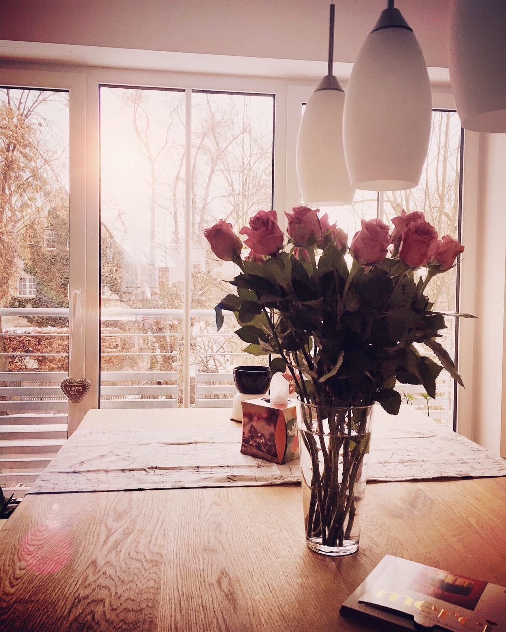 FLOWERS IN VASE AT HOME