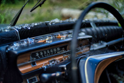 Close-up of cars on road