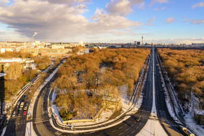 Aerial panoramic view, cityscape of berlin in winter season at tiergarten park during sunset.