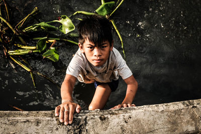 Portrait of boy in water