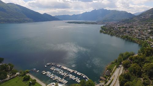 High angle view of bay and city against sky
