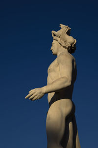 Low angle view of statue against clear sky