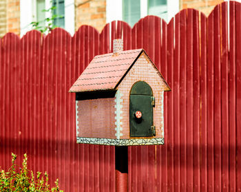 Close-up of birdhouse on building