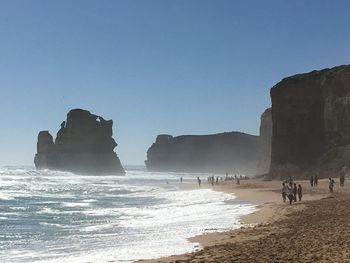 Scenic view of sea against clear blue sky