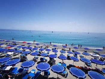 Scenic view of sea against clear blue sky