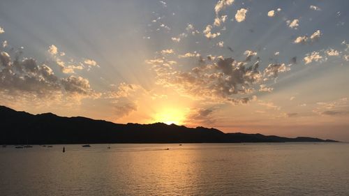 Scenic view of sea against sky during sunset