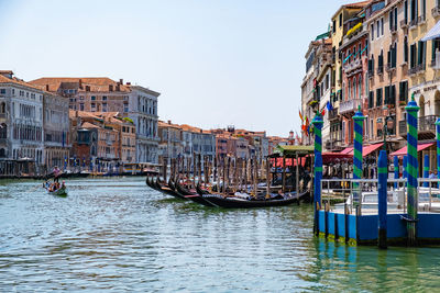 View of canal passing through city buildings